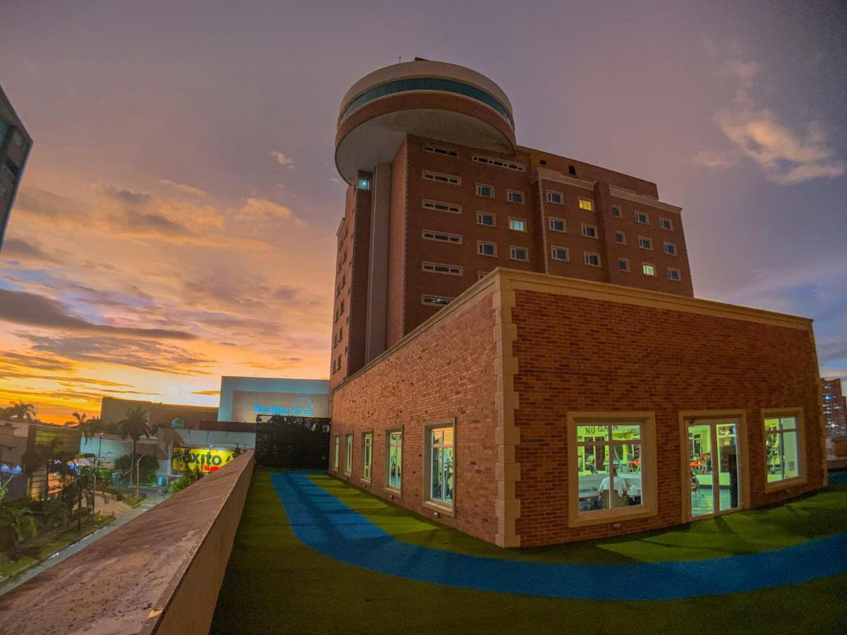 Hotel Dann Carlton Barranquilla Y Centro De Convenciones Exterior photo The hospital at sunset